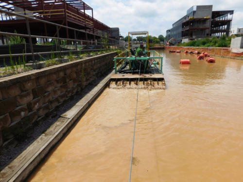 Placing the sand cap in the canal via IAI's custom built sand slurry dispersion system